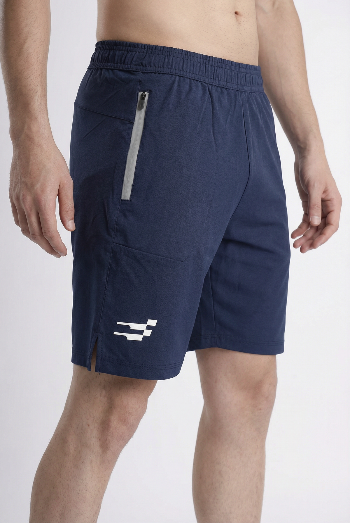 AirWave Performance Shorts in navy, close-up of the grey zip pocket, hem split and logo on the side