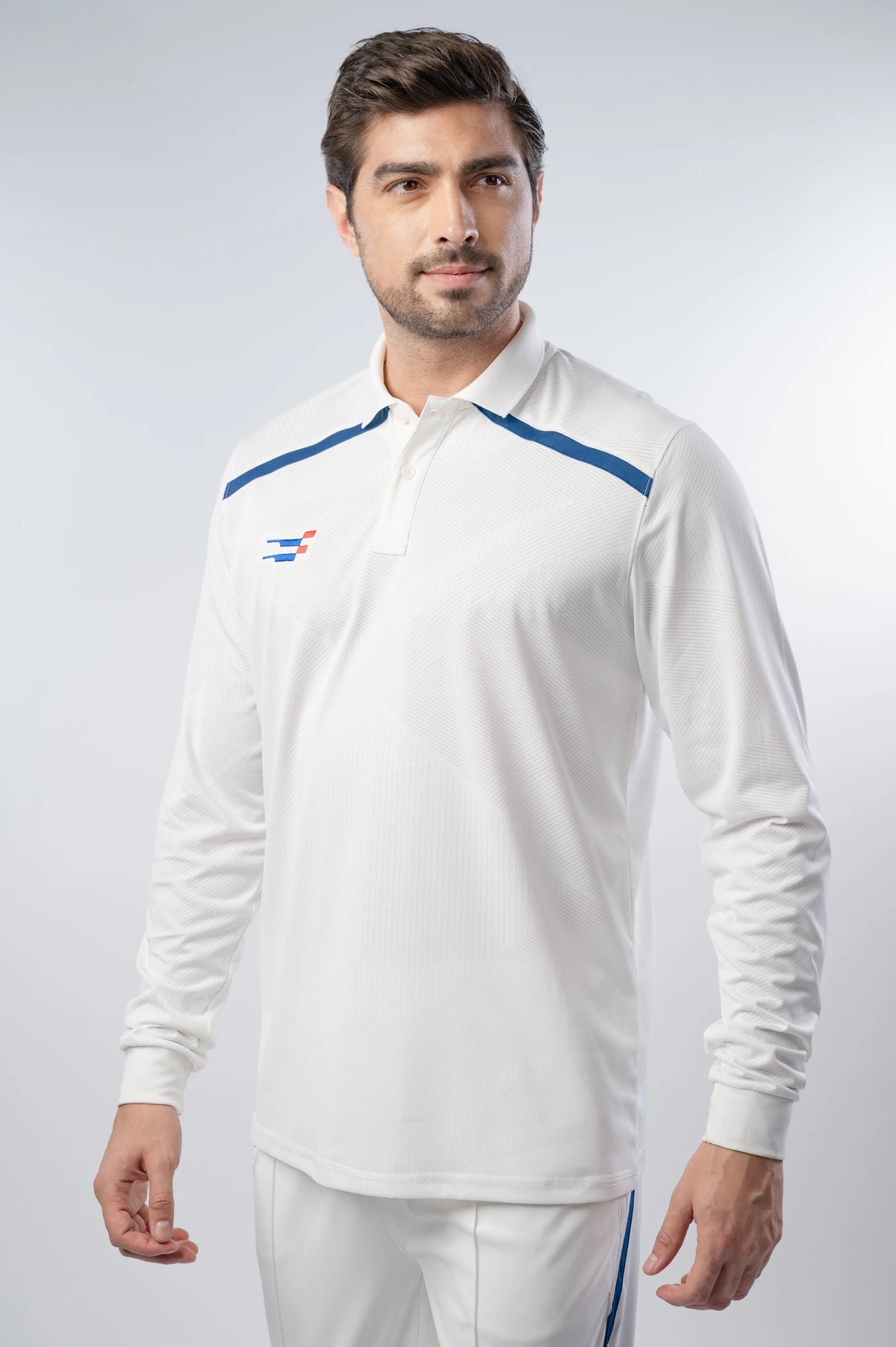 Bouncer Cricket Whites T-Shirt in white full sleeve, model turned slightly to the side, long sleeves with ribbed cuffs