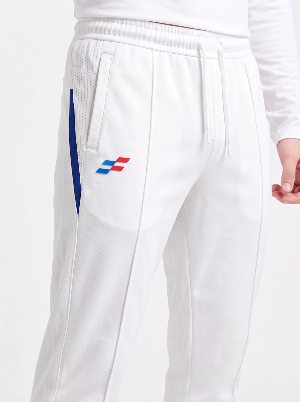 Bouncer Cricket Whites Trouser close-up: mesh side panel, navy pocket insert and Sportiff mark