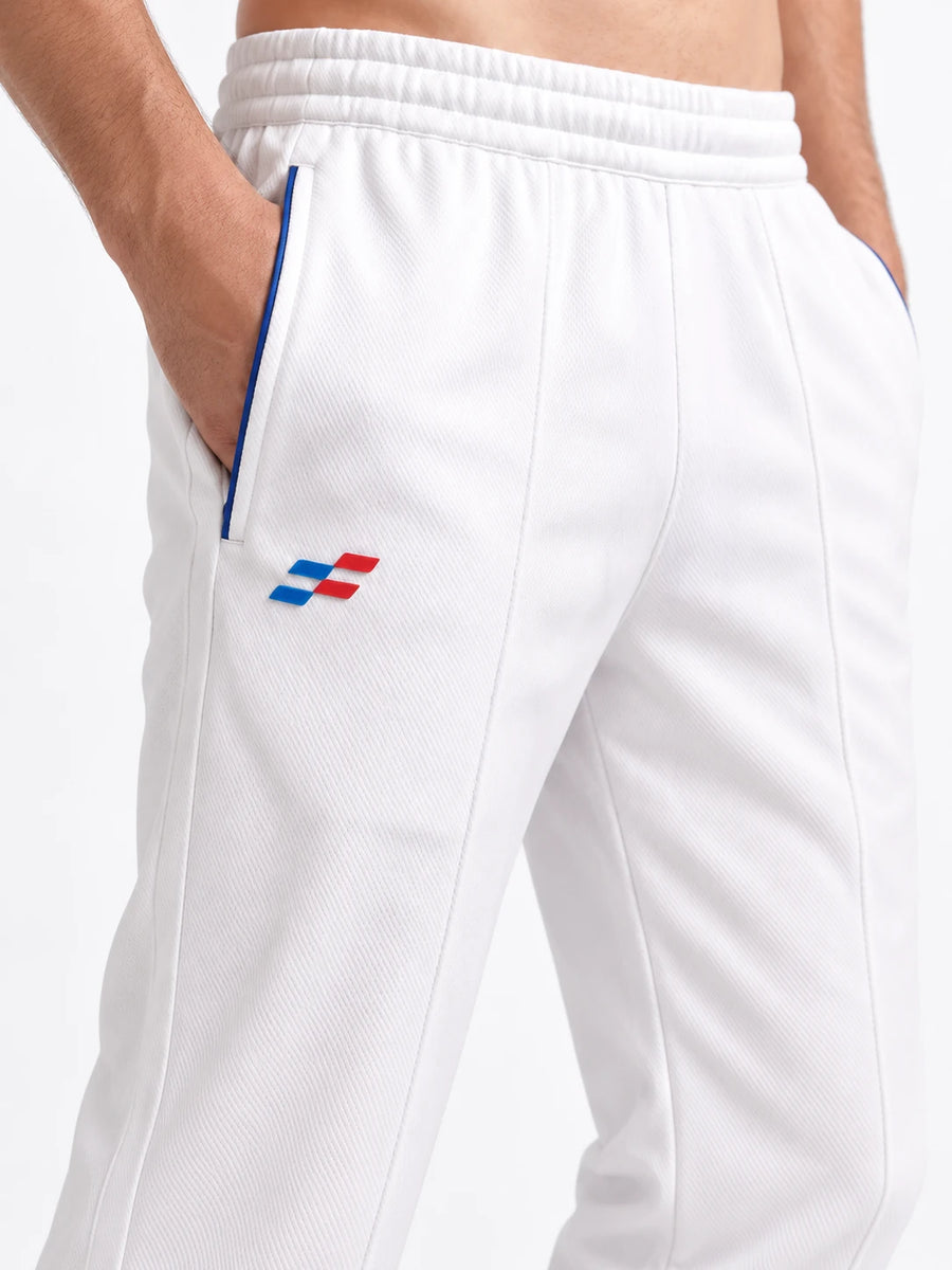 Cobra-Pro Cricket Whites Trouser, side view with hand in pocket