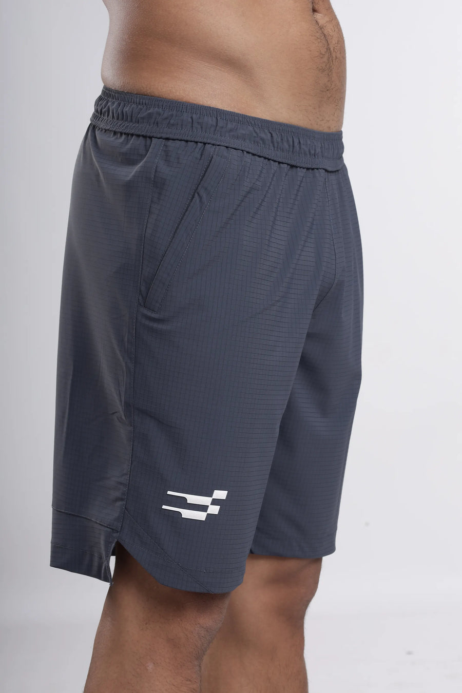 DynaAir Running Shorts in blue slate, side close-up of the textured fabric, curved hem and logo