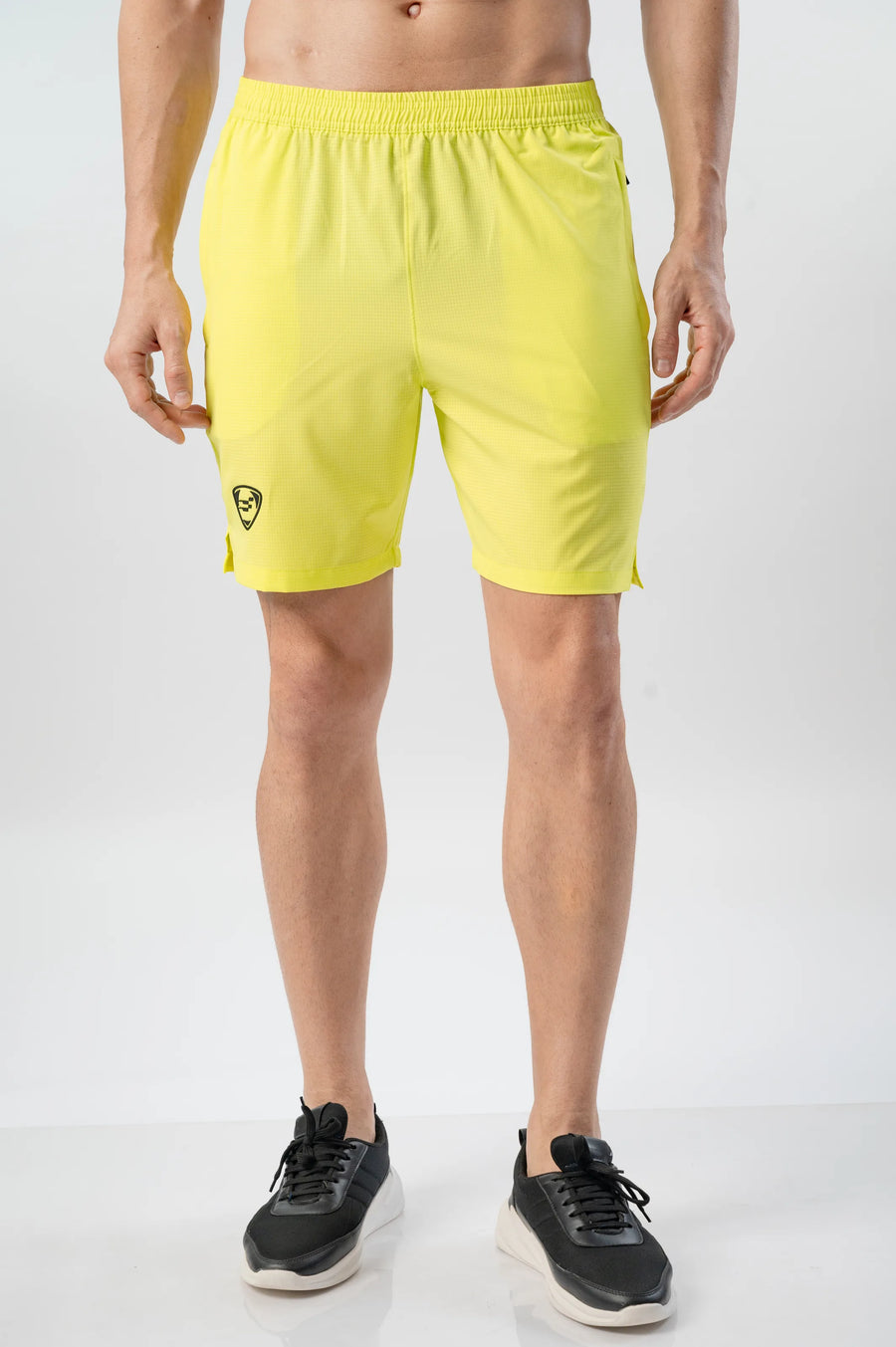 Fast-Track Running Shorts in yellow, front view on a model