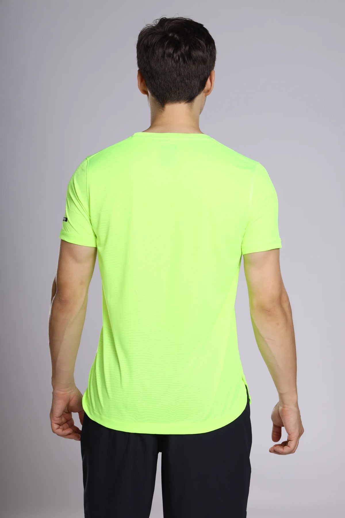 Fit-Gear Core Steel Performance T-Shirt in fluorescent yellow, plain back view with a curved hem