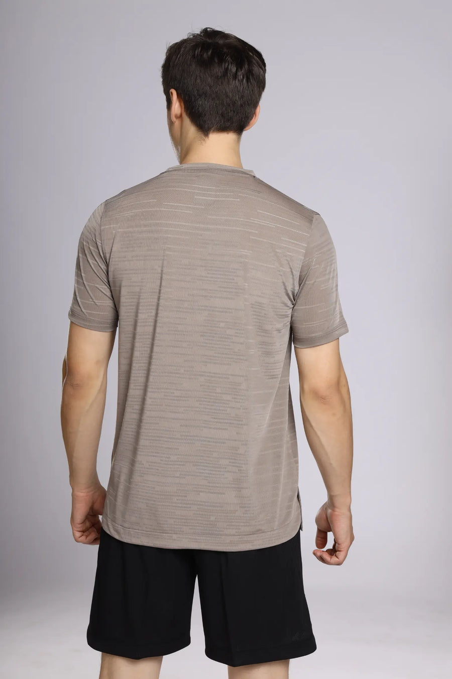 Fit-Gear Iron T-Shirt in hazelwood, back view on a model with black shorts
