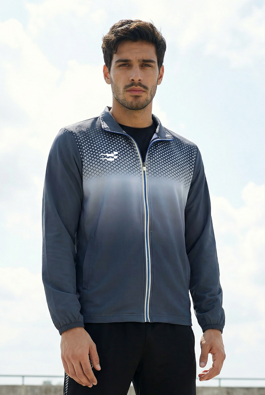 Nano-Shell Lightweight Performance Track Top in grey, front view outdoors showing the zip front and halftone gradient print