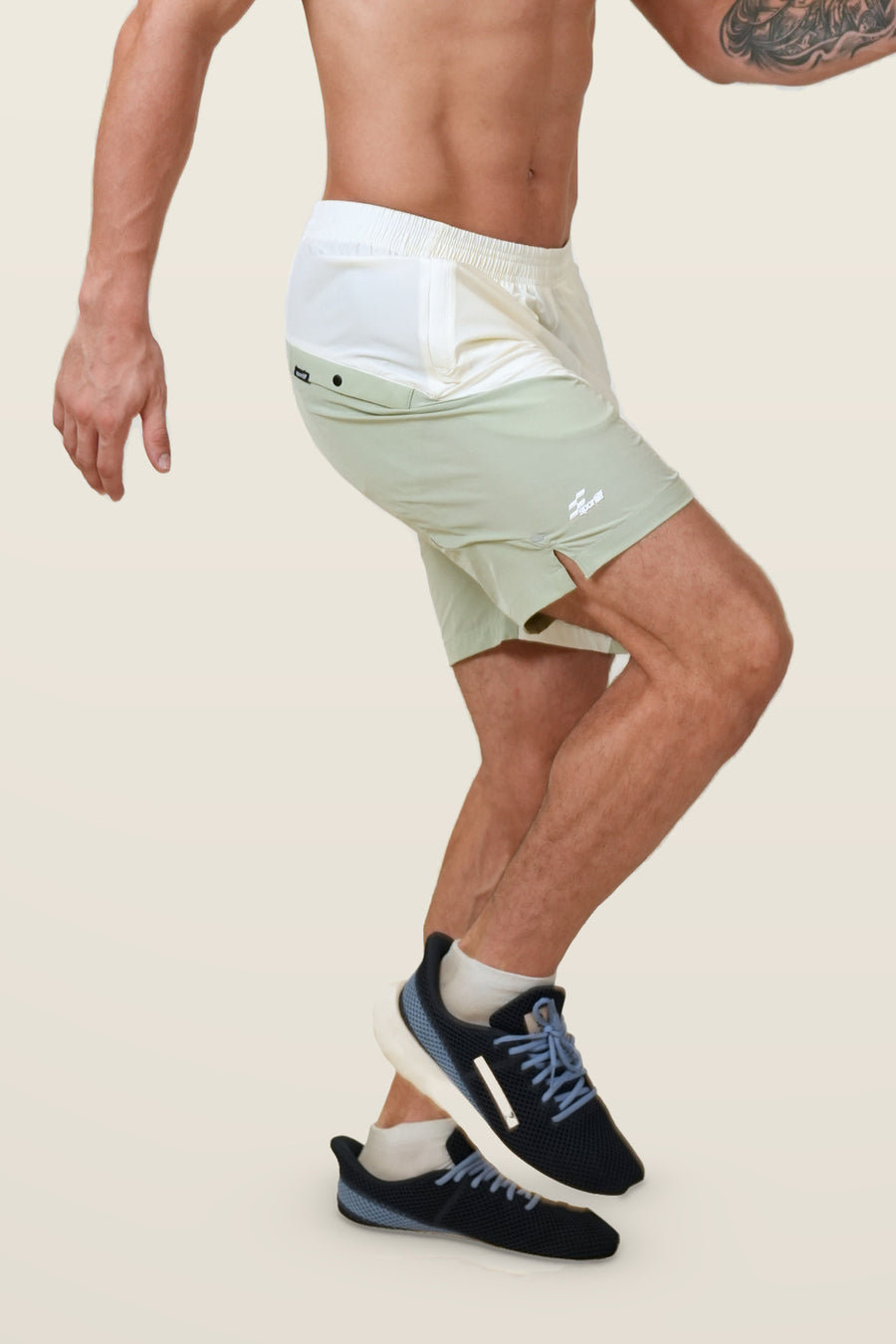 Pivot-Pro Performance Shorts | Ivory/Sage – three-quarter