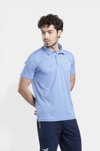 Sportiff brilliant blue performance polo t-shirt with snap button placket and breathable square tank knit fabric.