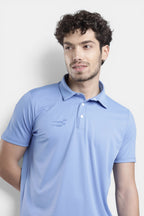 Sportiff brilliant blue performance polo t-shirt with snap button placket and subtle logo detail. Lightweight, breathable square tank knit fabric.