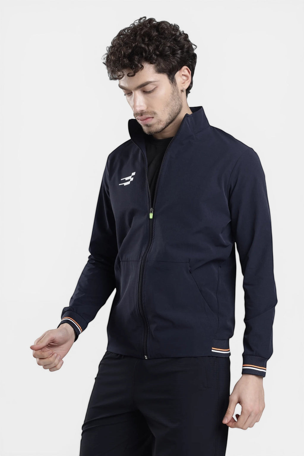 Sportiff navy blue woven shell and stretch performance track top with a full zip and striped cuffs.