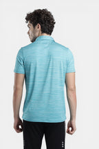 Sportiff Pulseline Performance Polo in scuba blue, featuring a textured diagonal jacquard knit fabric for breathability and a soft fit.