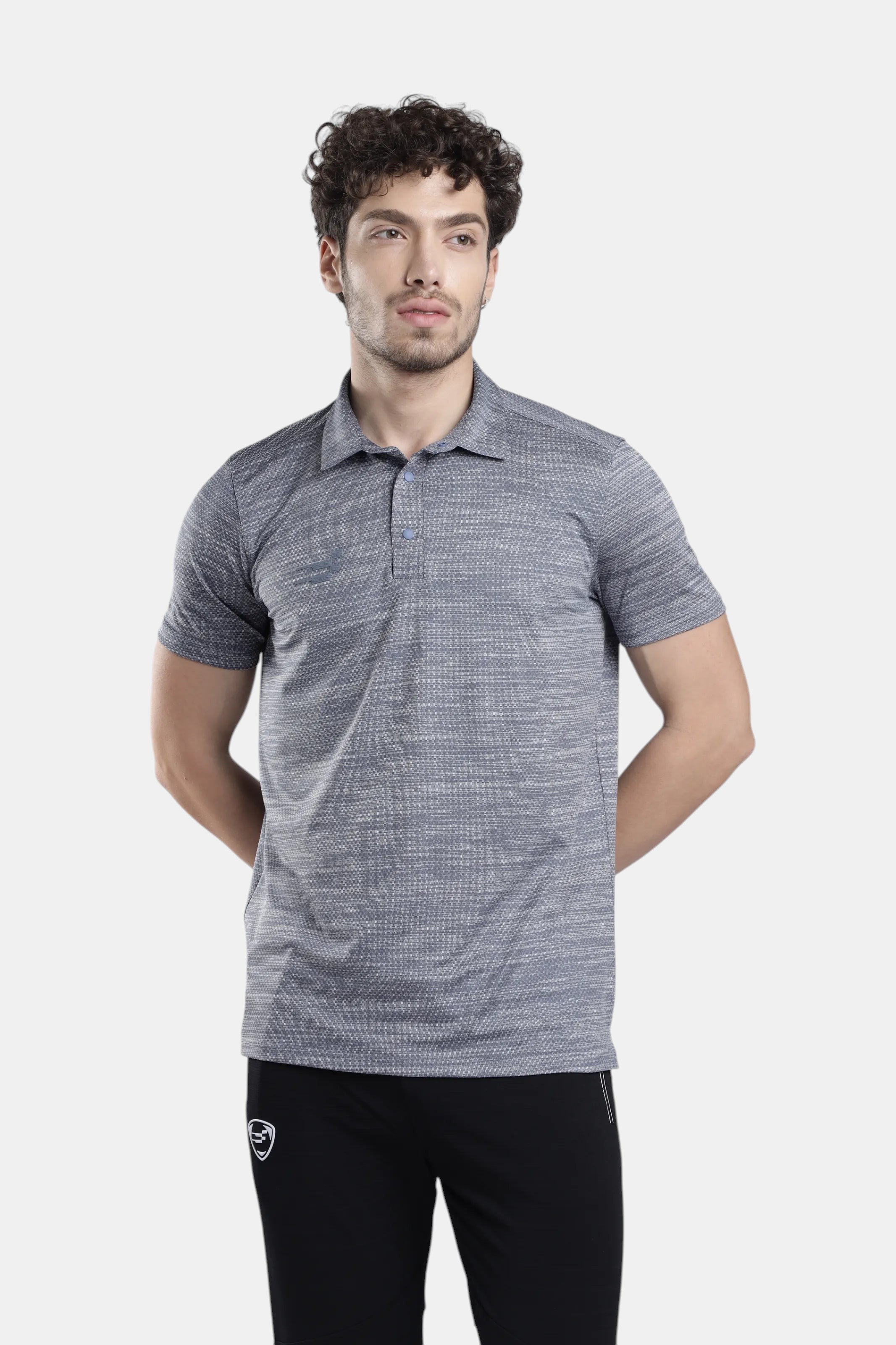 Sportiff Pulseline Performance Polo in smokestone grey. Lightweight, breathable jacquard knit fabric with a subtle textured pattern. Ideal for training or casual wear.