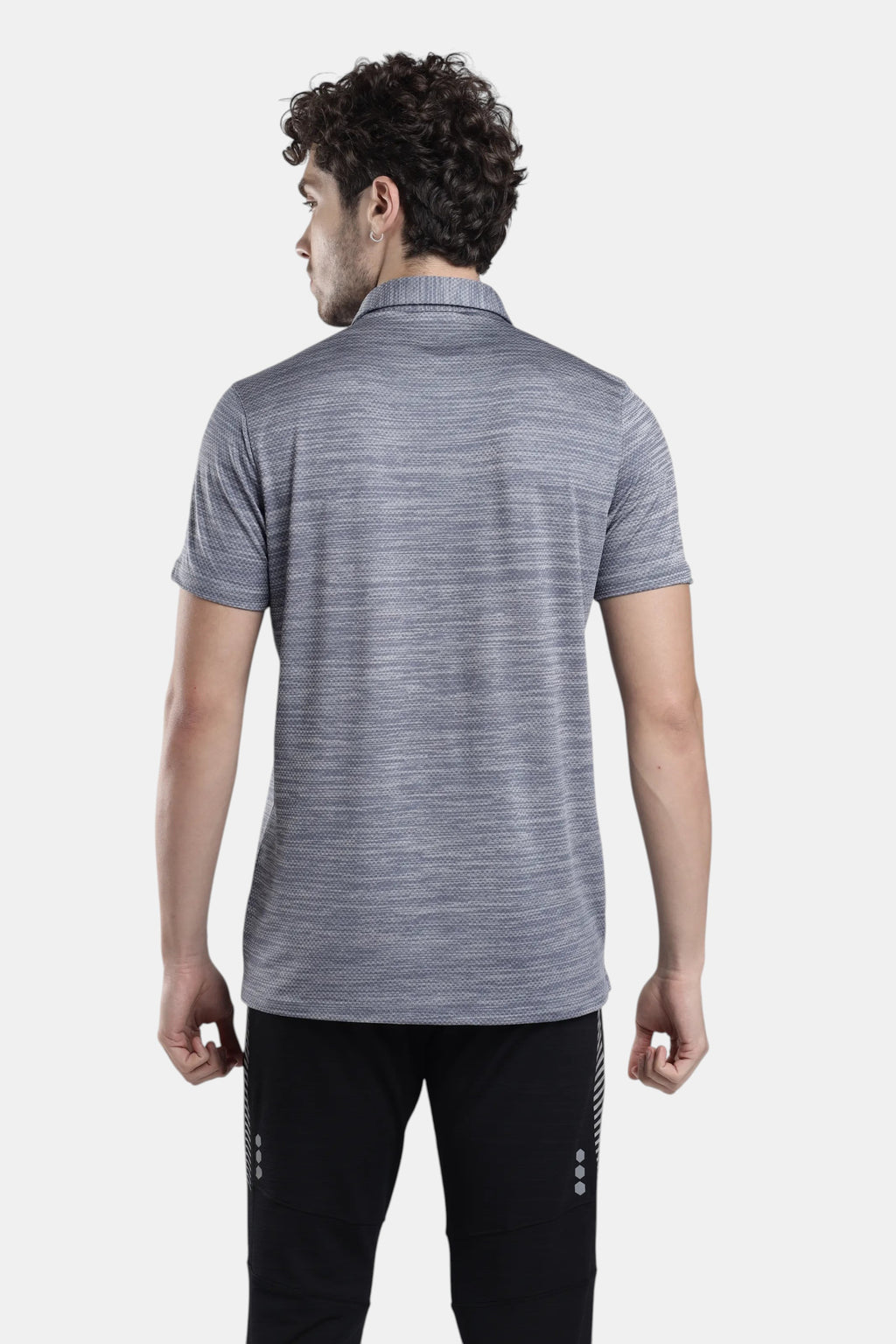 Sportiff Pulseline Performance Polo in smokestone grey, featuring a textured jacquard knit fabric and short sleeves. Designed for training and active wear.
