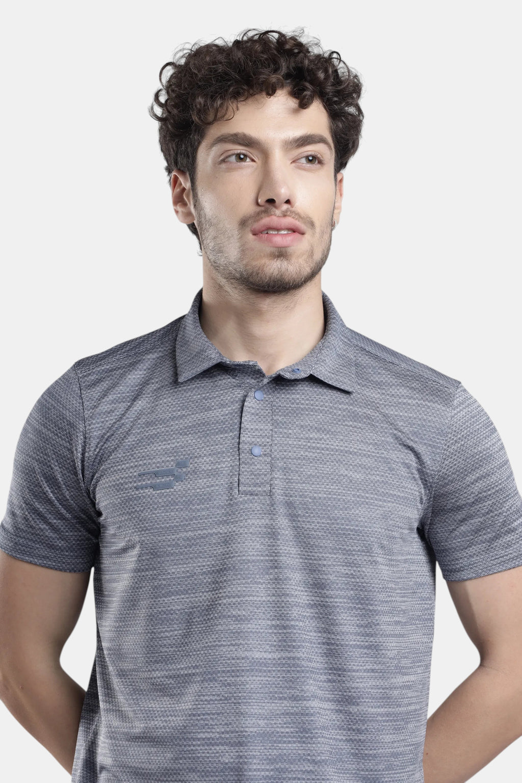 Sportiff Pulseline Performance Polo in smokestone grey with diagonal jacquard knit fabric and a subtle logo.