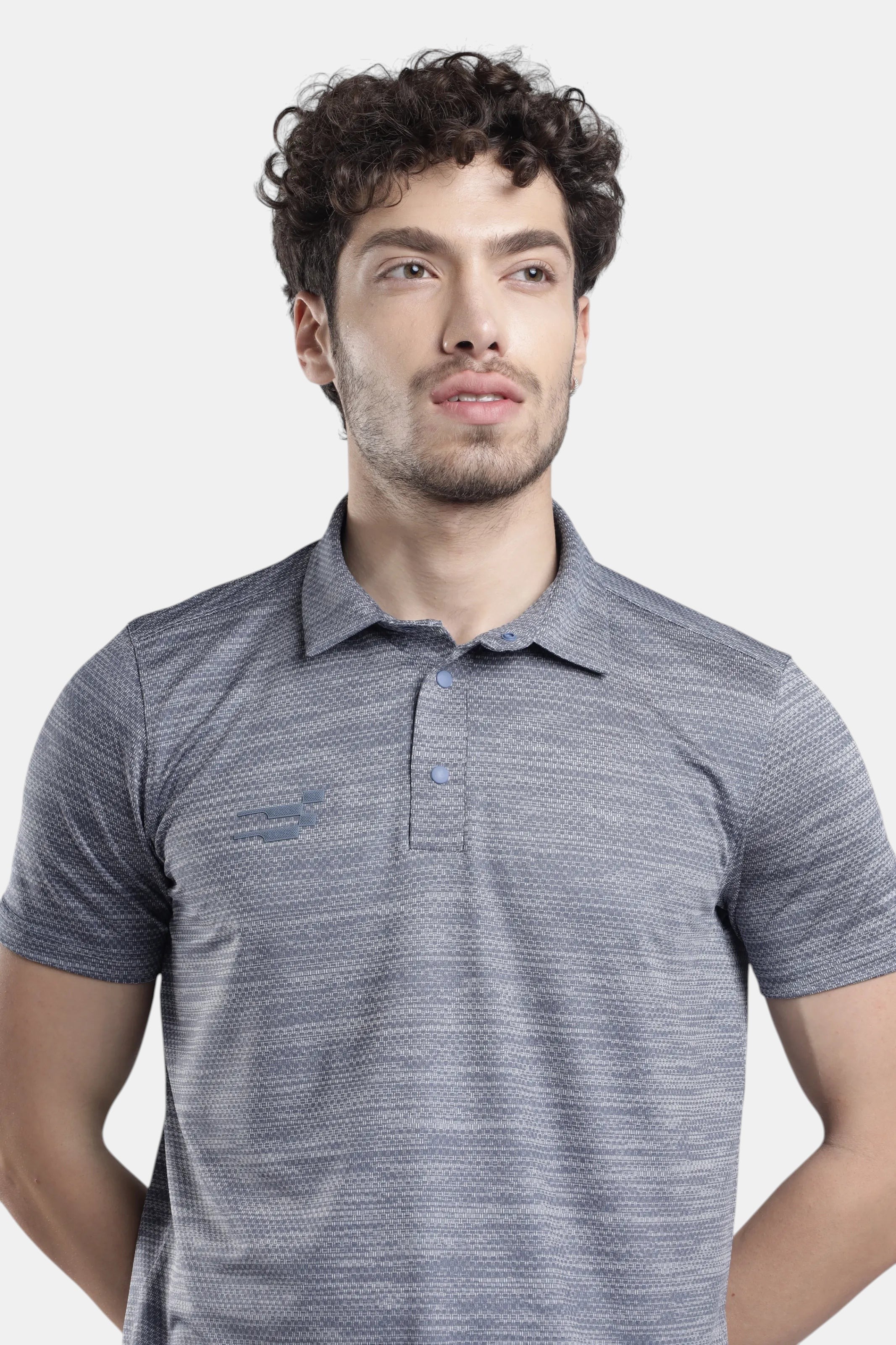 Sportiff Pulseline Performance Polo in smokestone grey with diagonal jacquard knit fabric and a subtle logo.