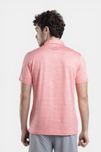 Sportiff Pulseline Performance Polo in salmon. Lightweight, breathable jacquard knit fabric for training or casual wear.
