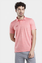 Man wearing salmon melange performance polo t-shirt for gym training