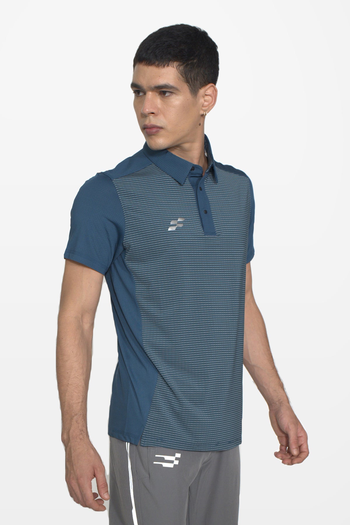 Strike Performance Polo T-Shirt | Teal – three-quarter
