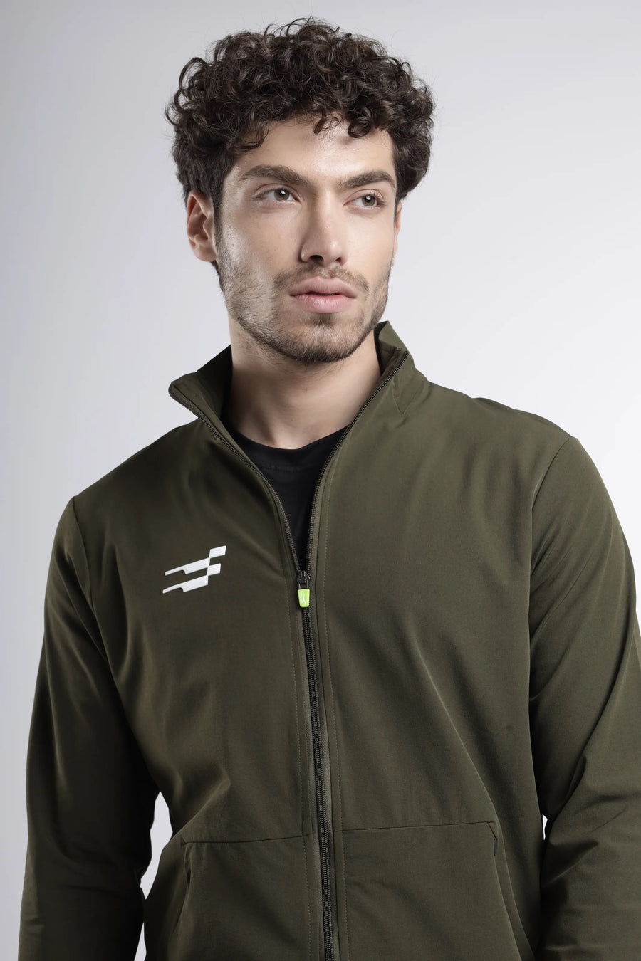 Tech-Shell Performance Track-Top in sage breeze, close-up of the stand collar, full zip with lime pull and chest logo