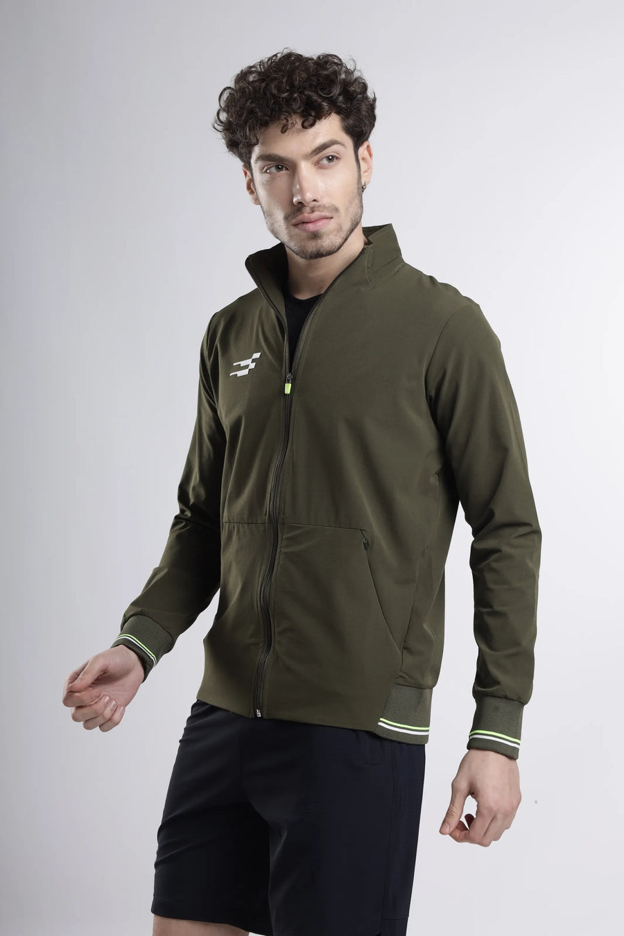 Tech-Shell Performance Track-Top in sage breeze, three-quarter front view with a full zip, zip pocket and ribbed cuffs
